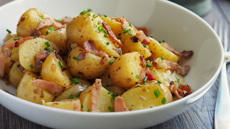 German potato salad with bacon bits and chives