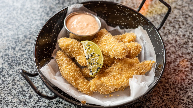 Crispy panko breaded fried fish with creamy dipping sauce