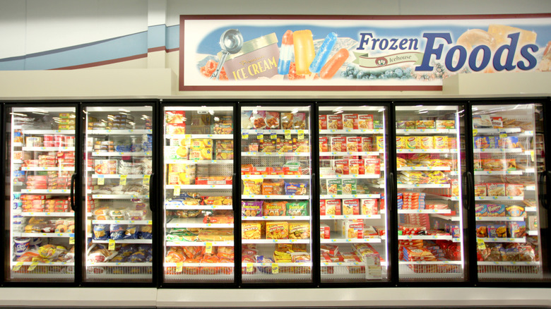 The frozen food aisle of a grocery store.