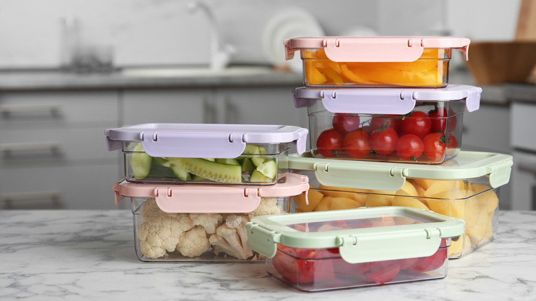 Fresh vegetables in clear stackable containers