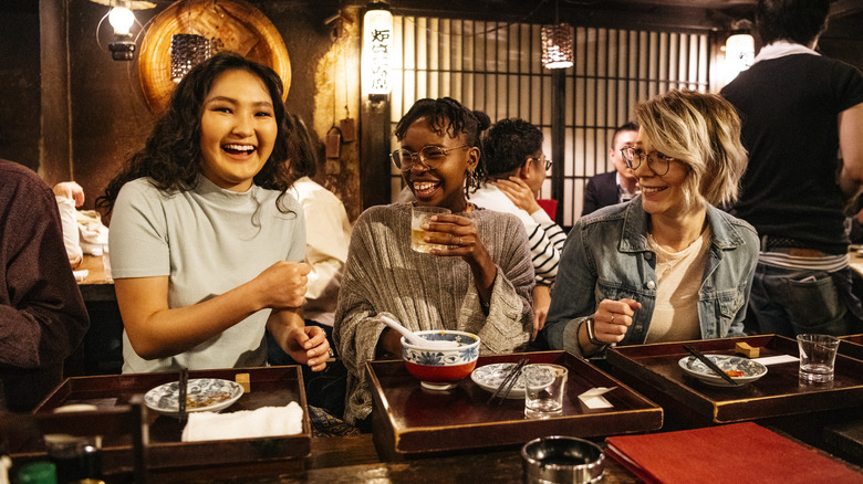 Three women in Japanese restaurant