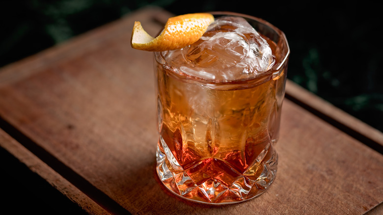 Old-fashioned cocktail with orange twist