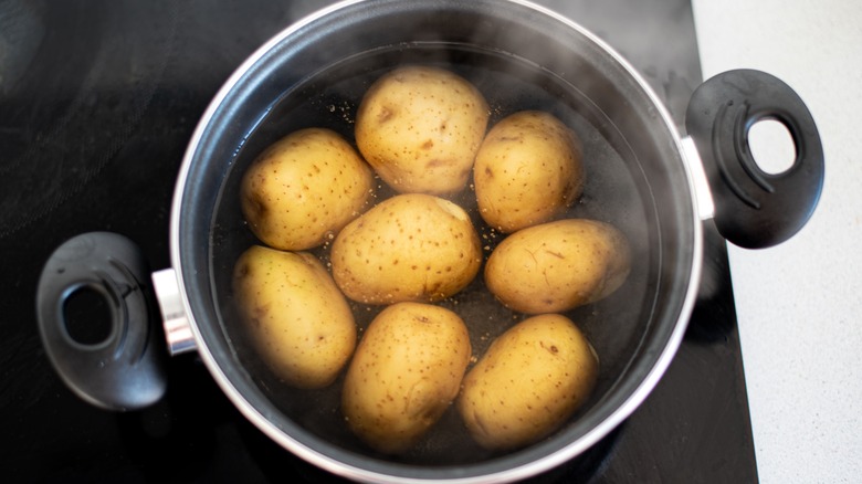 potatoes boiling in pan