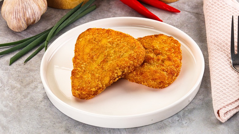 hash browns on white plate