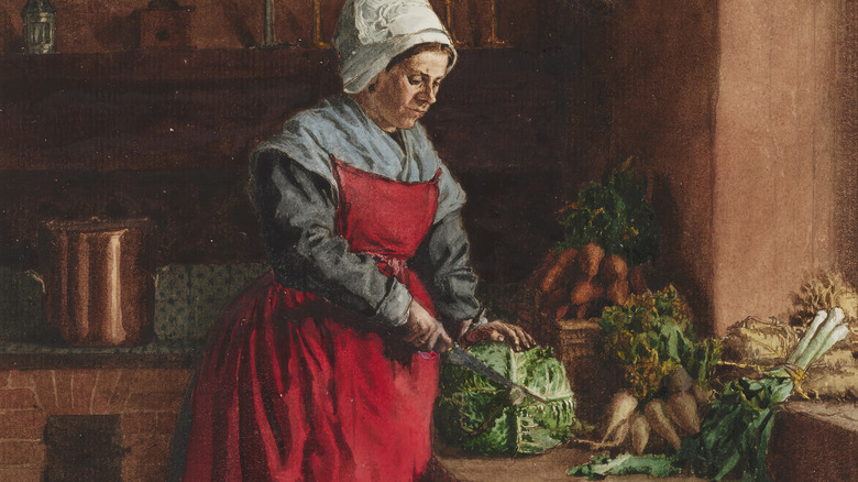 woman chopping cabbage