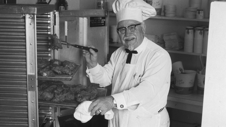 Colonel Sanders cooking in KFC kitchen