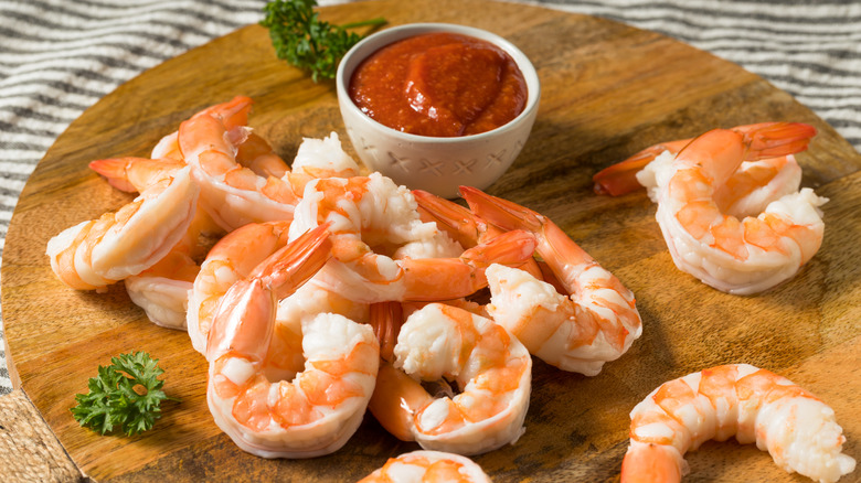 platter of cocktail sauce and shrimp