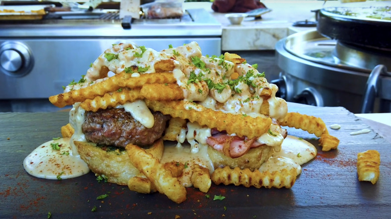 Closeup of a Horseshoe Sandwich with fries and cheese sauce