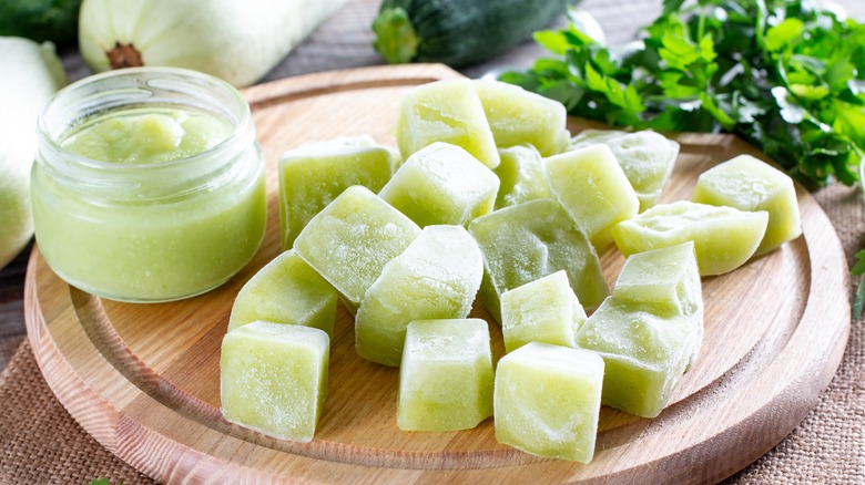 Frozen cubes of vegetables and herbs