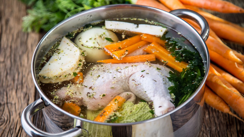 Pot of vegetables and chicken for broth