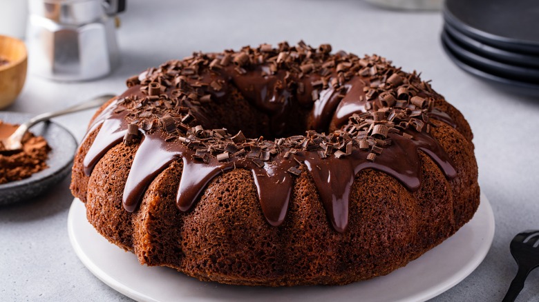 Chocolate bundt cake with chocolate ganache and curls