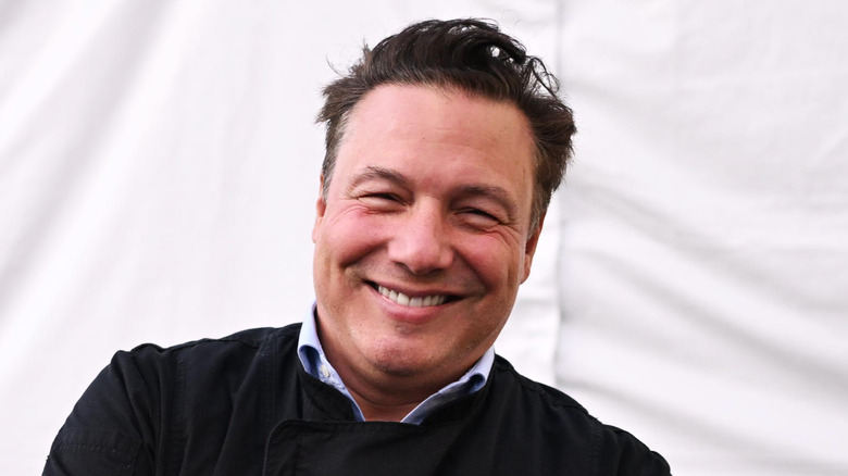 Rocco DiSpirito smiling at event