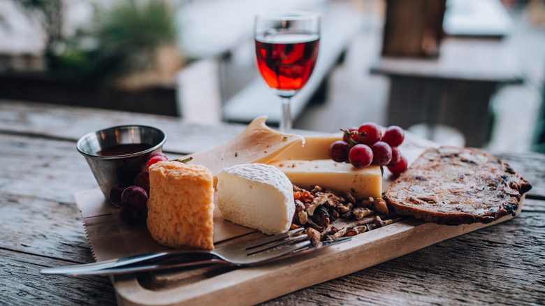Cheese plate with glass of port wine