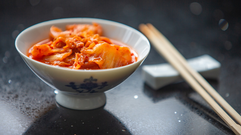 A porcelain bowl of kimchi