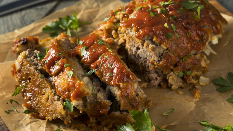 Sliced meatloaf on parchment paper