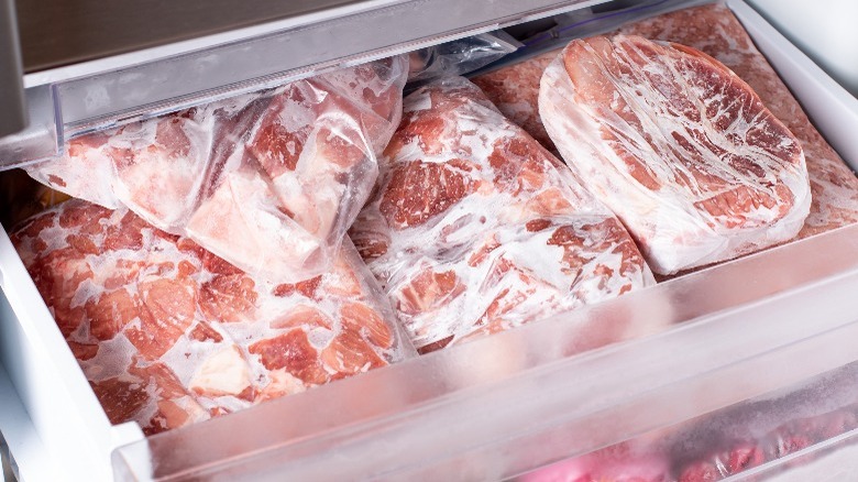 Packaged meat in freezer