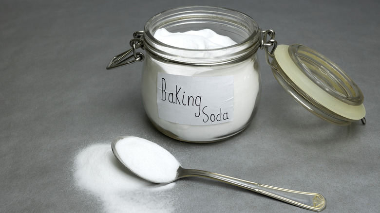 jar of baking soda with spoon