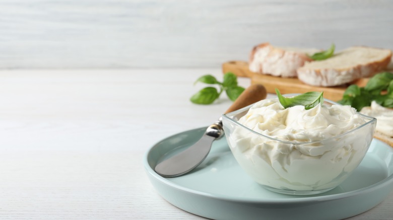 Cream cheese in glass bowl