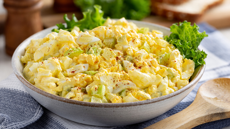 Egg salad in a bowl on a table