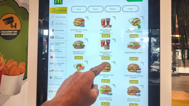 A touchscreen McDonald's menu in France showcasing international menu items