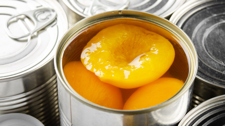 Opened can of peaches