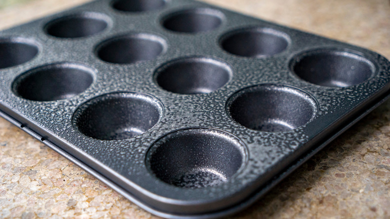 empty muffin tin ready to be filled
