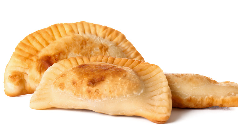 meat pies from Natchitoches on a white background