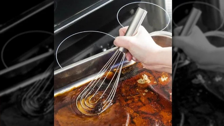 Using a flat whisk to mix a pan sauce