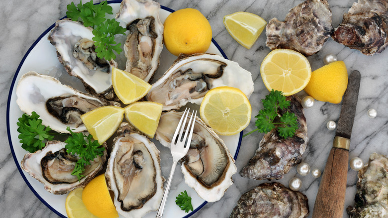 Oysters with a fork