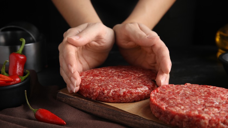 Forming beef patties to make burgers