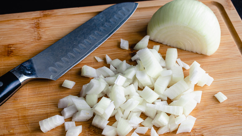 Chef's knife chopping onions 