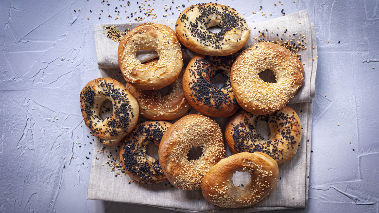 bagels in a pile on a table