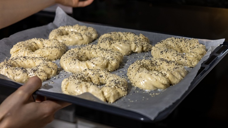 bagels being put in oven