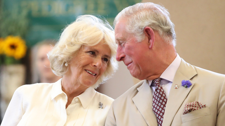 King Charles and consort Camilla at 2018 reopening of Edwardian community hall The Strand Hall in Builth Wells, Wales