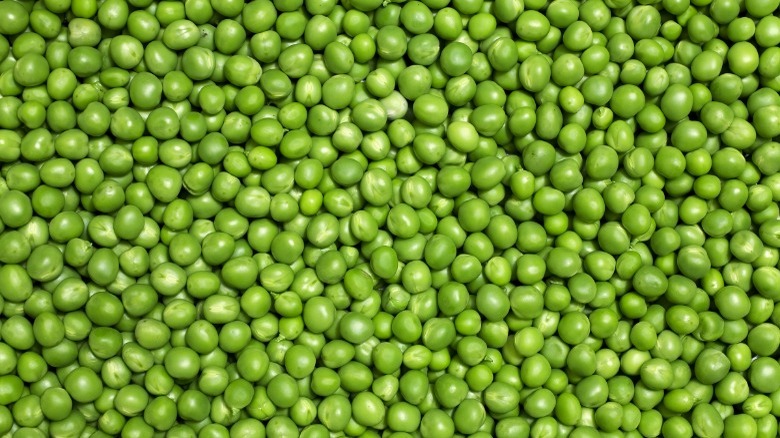 Green peas piled on top of each other