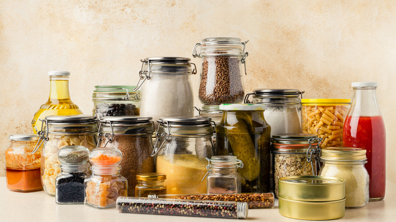 Kitchen pantry ingredients, oil, canned fish, and salt