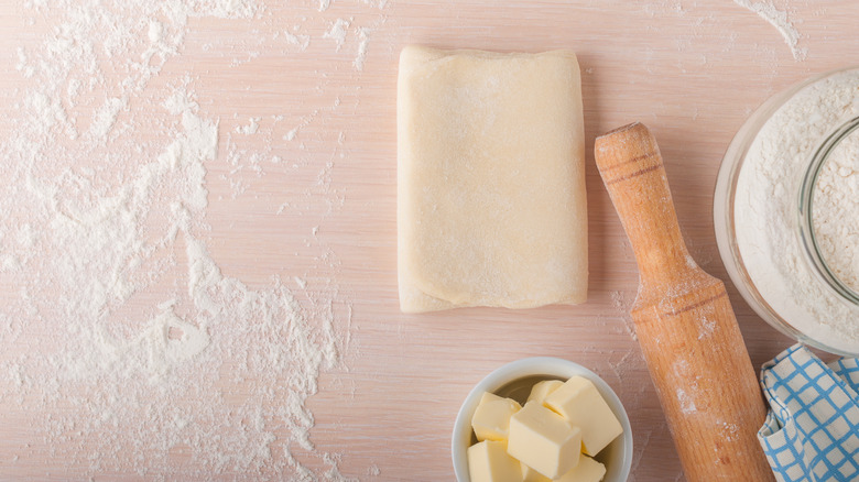 raw puff pastry and flour