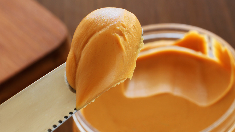scoop of peanut butter on a knife