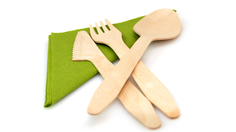 Wooden cutlery on a napkin