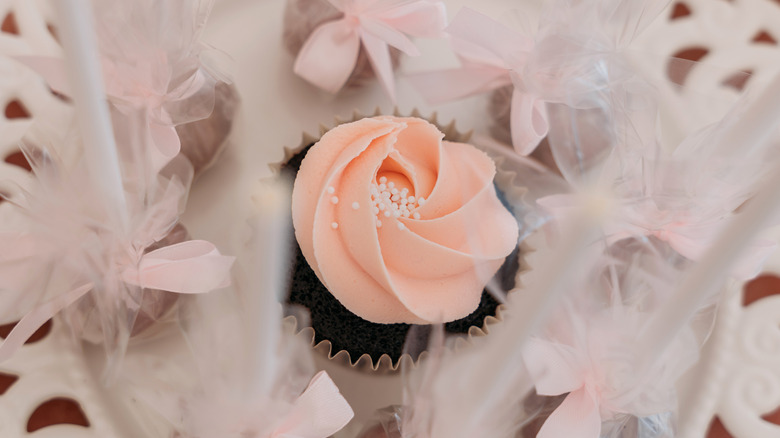 A cupcake with a buttercream rosette.