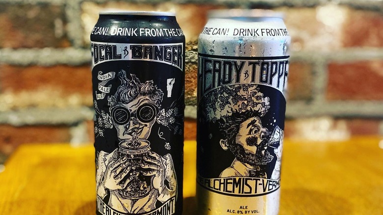 Two cans of The Alchemist beer