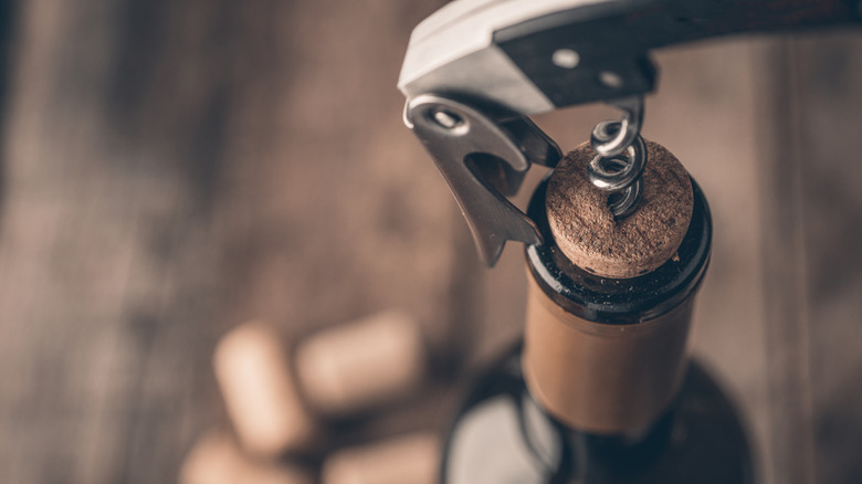 Uncorking a cork wine stopper