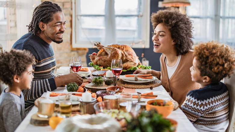 Family enjoying Thanksgiving dinner 