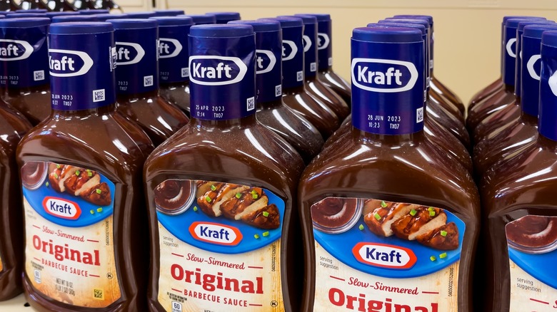 Bottles of Kraft Original Barbecue Sauce on store shelf