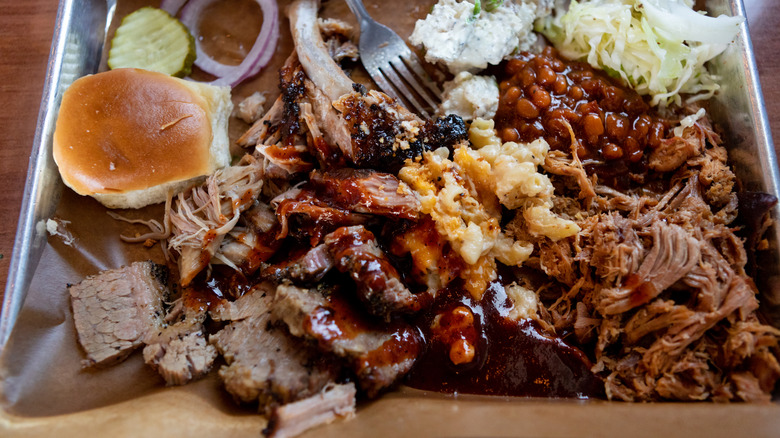 A full plate of assorted BBQ foods