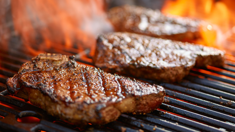 Grilling a steak on a barbecue