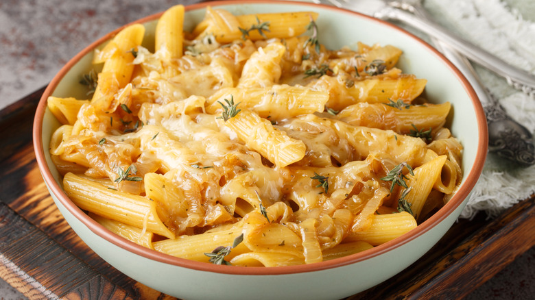 Penne pasta with caramelized onions