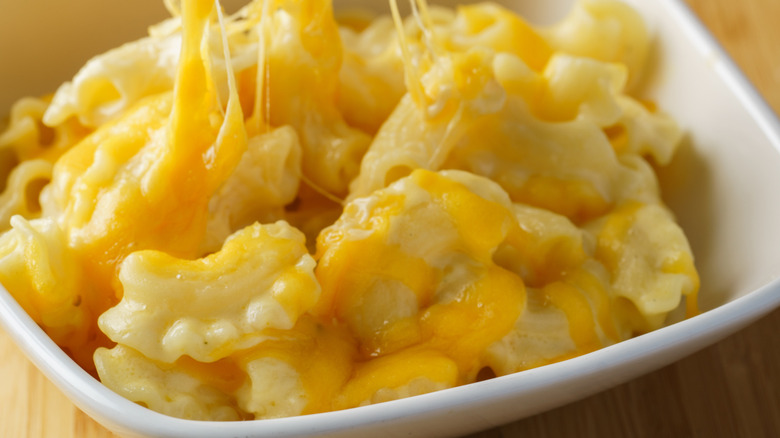 Cheesy macaroni and cheese in a white dish