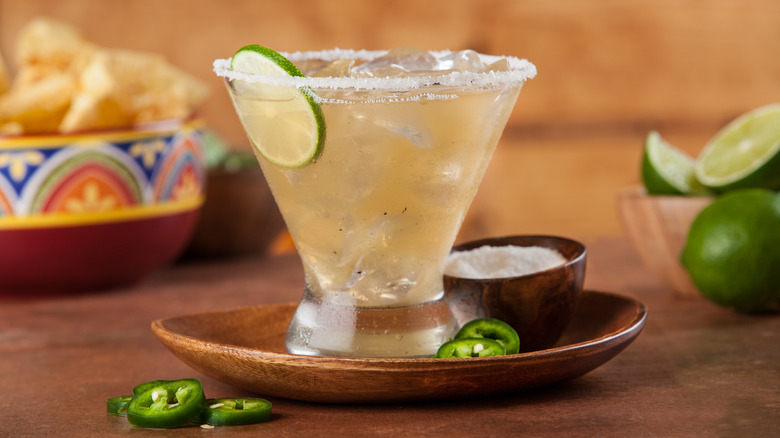 Margarita on the rocks with salt and jalapenos on the side