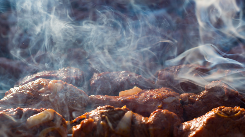 meat smoking in a smoker